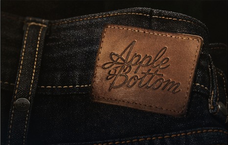 Apple Bottom leather patch on dark denim